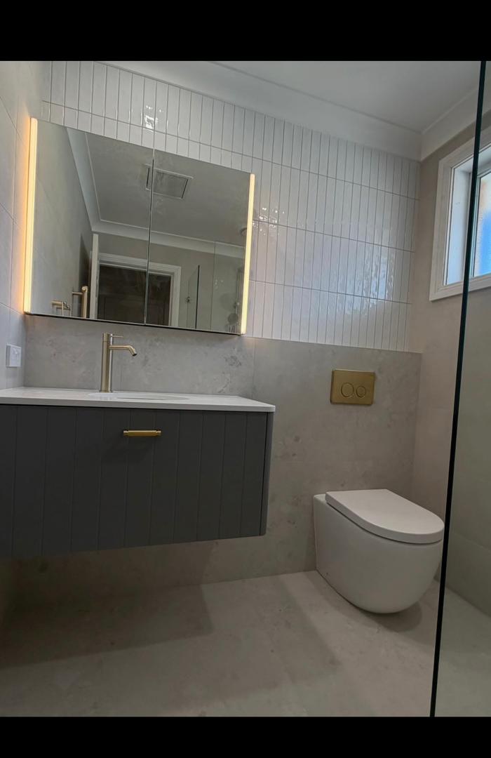 Premium gold fixtures bathroom — Geemuk Plumbing Bulawayo